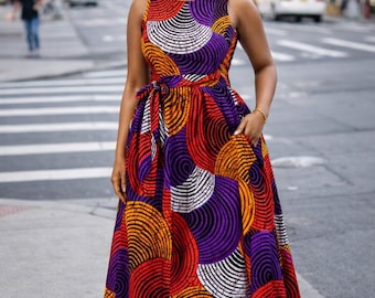 Vestido largo real con estampado wax: mangas abullonadas y estampado gráfico.