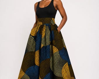 Jupe Wax Mi-Longue Évasée – Taille Haute avec Poches | Style Africain Chic & Élégant |