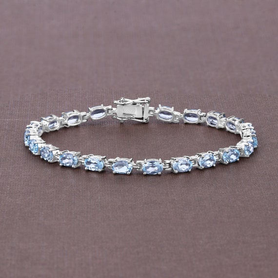 Blue topaz silver bracelet discount