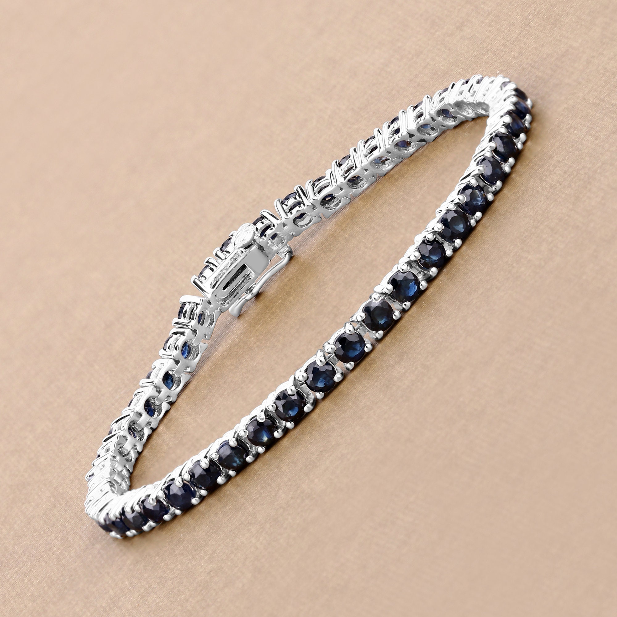 Sterling Silver Weave Motif Bracelet with Blue Sapphire Embellishments main image 0