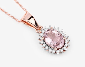 May include: A delicate rose gold necklace with a pink oval gemstone surrounded by a halo of sparkling diamonds.