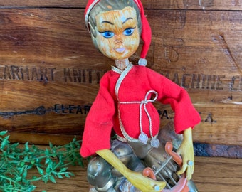 creepy elf doll