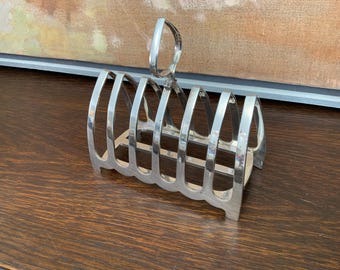 Zodiac 7-Slot Chrome Toast Rack – Stylish Stand For Cooling And Serving Bread