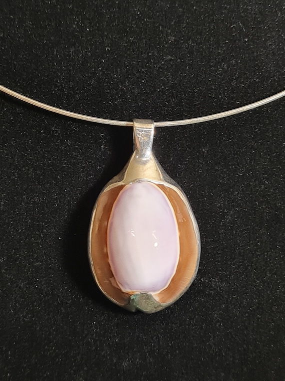 Pretty pink cowrie shell pendant with sterling sil