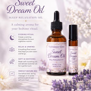May include: A brown glass bottle and roller bottle of Sweet Dream Oil by ViaBalance Glow. The bottles are labeled with the product name and details. The image includes text about the product's benefits, such as relaxation and a calming aroma.