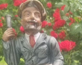 Stara ceramiczna figurka stary człowiek łowca ptaków