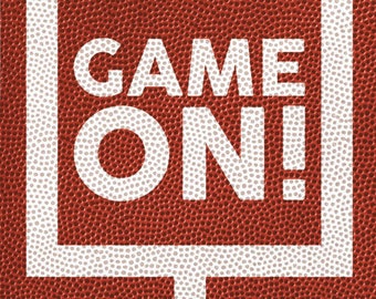 May include: A football-textured background with white goalposts and the words "GAME ON!" in bold white letters. The image has a close-up view of the football's textured surface, with the text and goalposts in a contrasting white color.