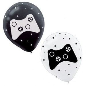 May include: Two balloons, one black and one white, each featuring a white or black video game controller graphic. Small star patterns surround the controller on each balloon. The balloons are likely for a gaming-themed party.