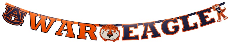 May include: A banner with the words "WAR EAGLE" in orange and navy blue block letters. The banner includes a tiger head and a cartoon tiger figure. The banner is likely for a sports team.