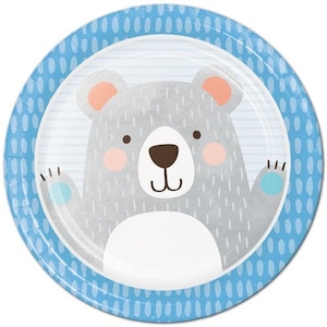 May include: A round paper plate with a blue dotted border. The center features a cartoon bear with gray fur, pink ears and cheeks, and a brown nose. The bear is set against a white and light blue striped background.