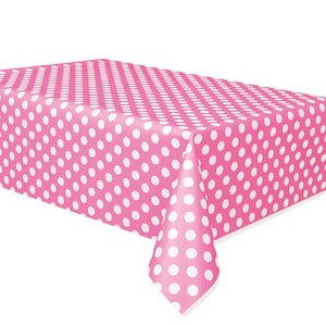 May include: A pink rectangular tablecloth with a white polka dot pattern. The tablecloth is made of a smooth material and is suitable for a party or event. The tablecloth is shown on a table.