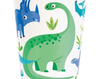 May include: White paper cup decorated with cartoon dinosaurs in shades of green and blue. The cup features a long-necked Brontosaurus, a Triceratops, and other prehistoric creatures, along with green foliage. The cup is designed for a children's party.