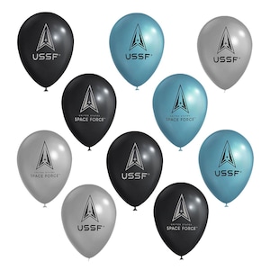May include: A collection of black, light blue, and silver balloons. Each balloon features the United States Space Force logo and the text "USSF" or "UNITED STATES SPACE FORCE".