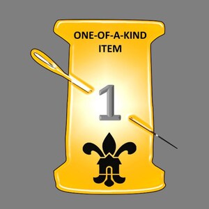 May include: A yellow spool with the text "ONE-OF-A-KIND ITEM" and the number "1" in a grey font. A black fleur-de-lis design is in the centre of the spool. Two needles are crossed over the spool.