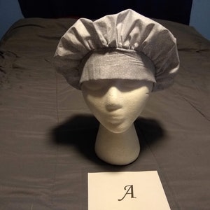 Bouffant style scrub cap. polka dots. Grey. Gray