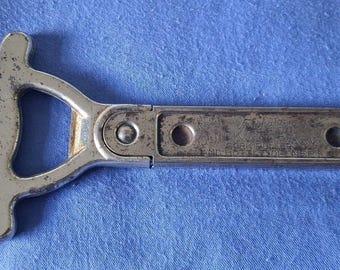 Abridor de garrafas/saca-rolhas incomum Vaughans Chicago da década de 1920, da época da Lei Seca.