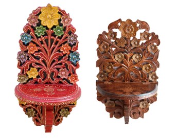 May include: Two wall-mounted shelves featuring intricate floral carvings. The left shelf is painted in vibrant red with multi-colored flowers in yellow, green, and blue. The right shelf is finished in a natural brown wood tone with matching floral carvings.