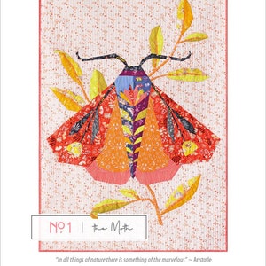 May include: A colourful quilt pattern featuring a moth with a pink, orange, red and yellow design. The moth is surrounded by green leaves and a white background with a small floral pattern. The quilt pattern is titled "The Moth" and is part of the "Wondergarden" collection.
