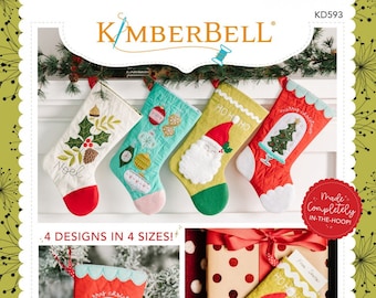May include: A collection of quilted Christmas stockings in various designs and sizes. The stockings feature festive motifs like holly, ornaments, Santa, and Christmas trees. The text "Noel" and "Merry Christmas" are visible on some stockings.