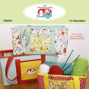 May include: Three wire-framed totes in different sizes, with floral patterns and a mesh pocket. The totes are filled with yarn and knitting needles. The text "I'm Washable!" and "#wireframedtotes" is visible. The totes are labeled "Wire-Framed Totes" and the text "Terrific totes, in three handy sizes, carry all sorts of goodies! A wire frame at the top edge makes the totes extra sturdy. Remove the wire frame and they're washable!" is also visible.