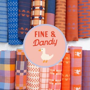 May include: A collection of rolled fabric in various colors and patterns, including blue, orange, and pink. The image features the text "FINE & DANDY" with a pixelated duck illustration. The fabrics appear to be textiles, possibly for home decor or crafting.