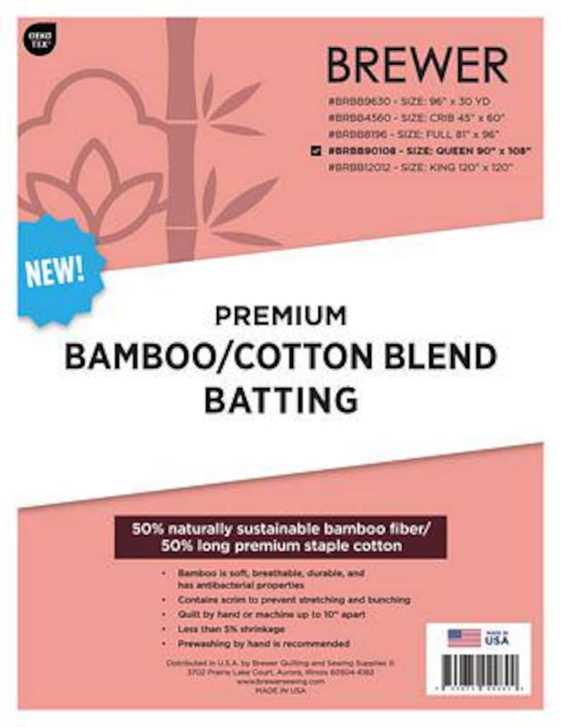 May include: A product information sheet for Brewer Premium Bamboo/Cotton Blend Batting. The sheet features a pink and white design with text detailing the batting's composition, including 50% bamboo fibre and 50% cotton. Sizes include Queen 228.6cm x 274.3cm.