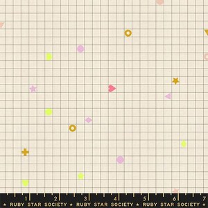 May include: A cream-colored fabric featuring a thin brown grid pattern overlaid with scattered small shapes including stars, hearts, circles, and plus signs in yellow, pink, and orange. A black ruler with the text Ruby Star Society is visible.