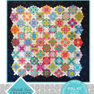 May include: A quilting pattern called "Prudence" by Lilabelle Lane Creations. The pattern is for a quilt with a colorful geometric design. The pattern includes instructions, templates, and fabric.