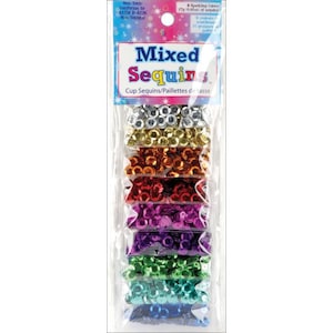 May include: A package of mixed sequins in various colors, including silver, gold, copper, red, purple, green, and blue. The package has the text "Mixed Sequins" and "Cup Sequins/Paillettes de tasse".