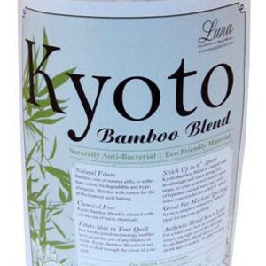 May include: A rolled white fabric with a label reading "Kyoto Bamboo Blend." The label includes green bamboo leaf designs and the text "Naturally Anti-Bacterial | Eco Friendly Material." The product dimensions are 206cm x 244cm.
