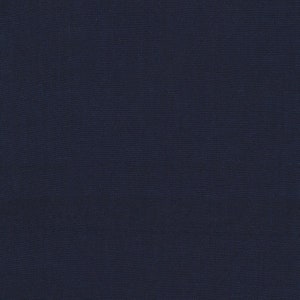 May include: A close-up shot of a navy blue fabric with a subtle, textured weave. The deep, solid color fills the frame, highlighting the material's smooth surface and the fine details of the textile.