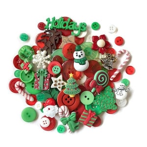 May include: A selection of Christmas-themed buttons in red, green, and white. The collection features buttons shaped like a snowman, Christmas tree, candy cane, and gift boxes. The word "Holidays" is written in green.