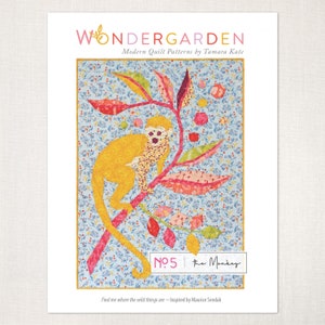 May include: A quilt pattern print showing a yellow monkey on a branch with colourful leaves and flowers. The background is a light blue floral pattern. The text "WONDERGARDEN" and "Modern Quilt Patterns by Tamara Kate" are at the top. The text "NO 5 the Monkey" is at the bottom.