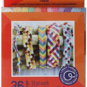 May include: A package of "Threadship" craft thread in pastel colors. The image shows several colorful woven friendship bracelets. The package includes 36 spools, each with 10 yards of thread, perfect for creative crafting projects.