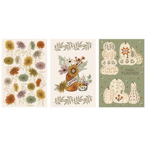 May include: Three decorative art prints with autumnal themes. One shows sunflowers in various colours. Another depicts a coffee can with flowers. The third print says "Hello Pumpkin" with pumpkin illustrations.