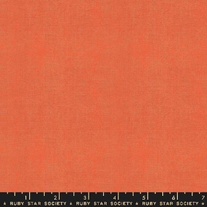 May include: A solid orange fabric with a subtle texture. The fabric is a solid color with no pattern or design.