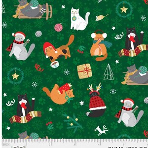 以下が含まれることがあります： 緑色の生地に、クリスマスの猫が繰り返されるパターン。猫たちはサンタ帽やスカーフなどのお祝いの衣装を着て、雪の結晶、オーナメント、プレゼントの中にいます。デザインは遊び心があり、季節感のあるテーマです。