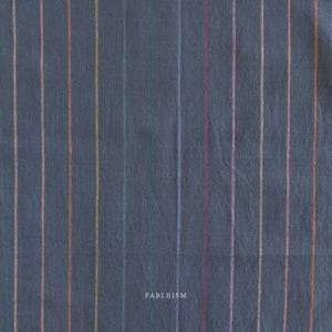 May include: Dark blue fabric with vertical stripes in various colours, including orange, green, and pink. The word "FABLEISM" is printed in white at the bottom right corner of the fabric.