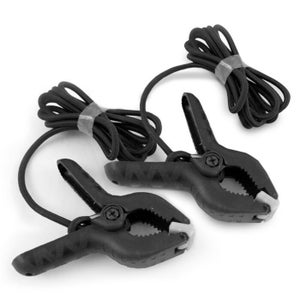 May include: Two black plastic clamps with elastic cords. The clamps have a spring-loaded jaw and a screw to tighten the grip.