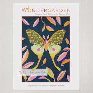 May include: A print showcasing a geometric butterfly design in green, yellow, and pink, set against a dark blue background with stylized leaves. The text "WONDERGARDEN" and "Modern Quilt Patterns" are at the top. The text "No 13 | the Luna Moth" is at the bottom.