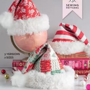 May include: Three Santa hats with white faux fur trim. One hat is red with white floral print, another is red and white striped, and the third is a patchwork design. The text reads "The Snowbound Hat" and "A Quilted Santa Hat Sewing Pattern."