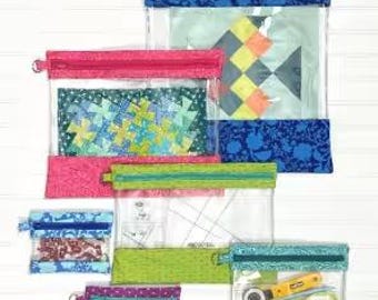 May include: Clear, zippered storage bags in various sizes, with colorful fabric accents. The bags are labeled "Clearly Organized" and feature different patterns and contents, including sewing supplies and fabric pieces. The image includes the text "Keep your projects and supplies organized and easily see what's inside."