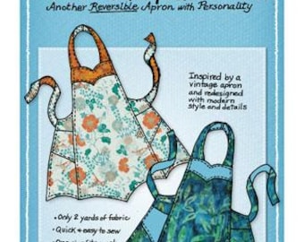 May include: A sewing pattern for a reversible apron, featuring two apron designs with floral and botanical patterns. The pattern includes the text "Chatterbox Apron Pattern" and "Mary Mulari Designs". The apron requires only 2 yards of fabric.