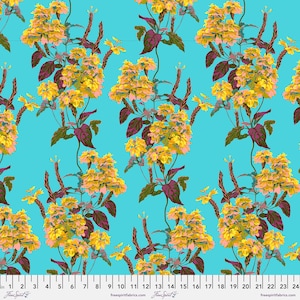 May include: A teal blue fabric with a repeating pattern of yellow and pink flowers with brown stems. The fabric has a ruler printed at the bottom with inches marked.