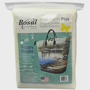 May include: A package of Bosal In-R-Form Plus foam stabilizer. The package features a Happy Hauler tote bag design with a scenic lake view. The stabilizer measures 54 inches by 58 inches and is double-sided, fusible, and needle-friendly.