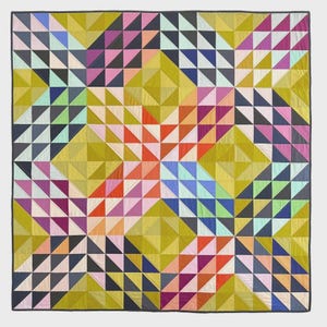 May include: A square quilt titled Big Ocean by Tara Faughnan featuring a geometric pattern of triangles in olive green, red, orange, pink, purple, and blue. The text states finished quilt sizes of 40" x 40", 64" x 64", and 96" x 96".