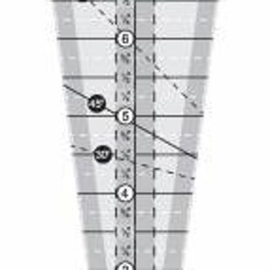 May include: A clear plastic 15-inch triangle ruler designed by Kim Underwood. The ruler has markings in inches and fractions of an inch. It also has a 2-inch hole in the center.