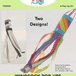 May include: A pop-up kit for making a windsock. The kit includes instructions, a spring, a swivel hook, and a label. The windsock is made with 2-1/2 inch strips of fabric and a fat quarter. The kit features two designs, one with black and white stripes and the other with colourful stripes.
