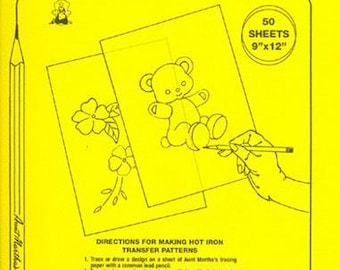 May include: Yellow tracing pad with the text "Tracing Pad" and "50 Sheets 23cm x 30cm". Includes instructions for hot iron transfer patterns. Features illustrations of a teddy bear and flowers.