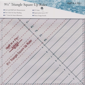 May include: A clear acrylic 9.5-inch triangle square up ruler with black and red markings. The ruler features inch and half-inch measurements, 45-degree lines, and seam allowance markings. Text on the ruler includes "9 1/2" Triangle Square Up Ruler" and "Quilt in a Day".